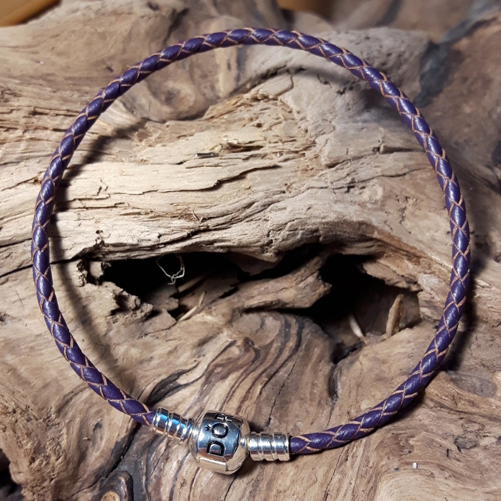 Purple leather Pandora bracelet.